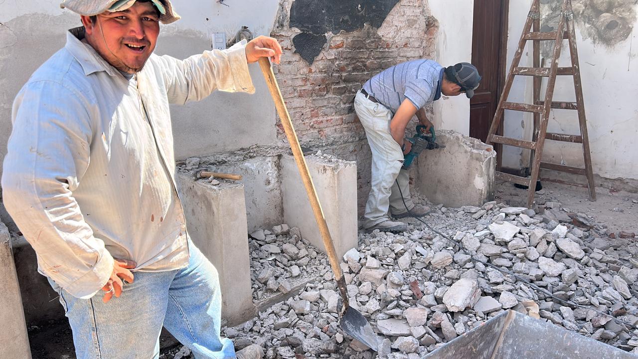 Removing brickwork beside the old chimney