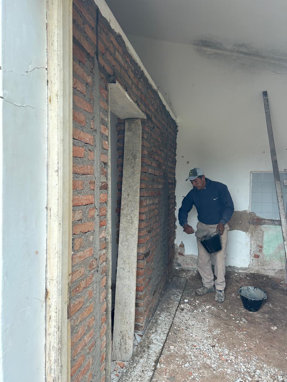 Interior brickwork and a doorway during construction