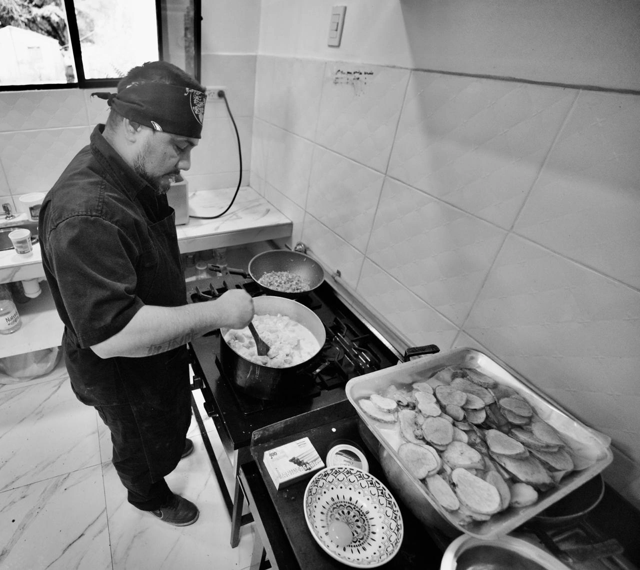 Preparing a meal in the kitchen at our current operation.