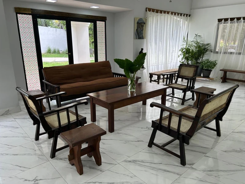 Armchairs and windows in a shared space.