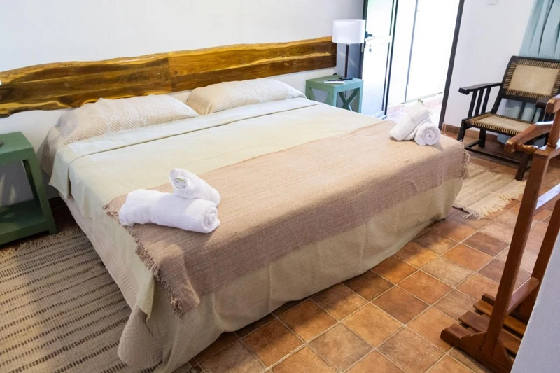 A room prepared with beds and towels.